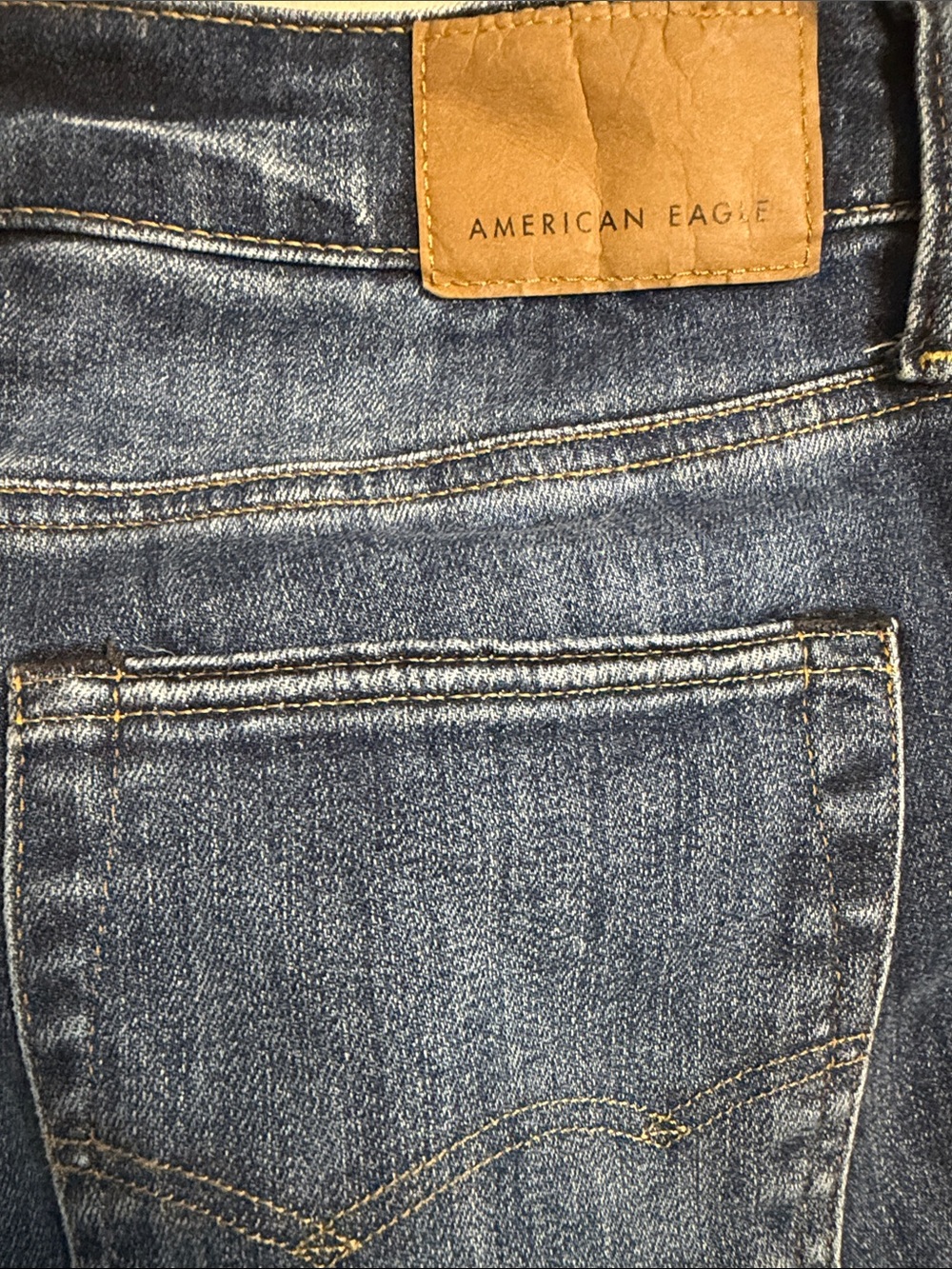 American Eagle Outfitters Men's Medium Blue Slim Jeans with Tan Patch